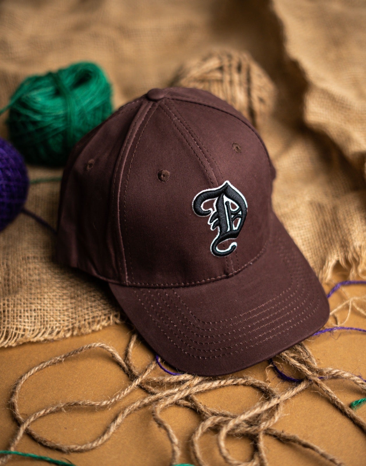 Brown D premium cap