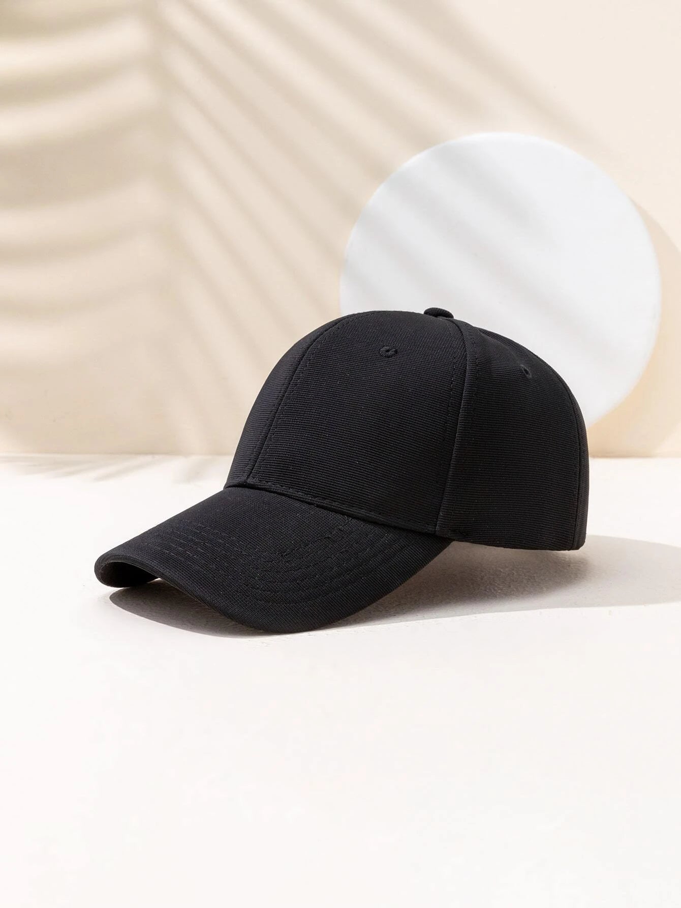 Simple black cap hotsell