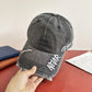 Grey NGU ripped denim cap